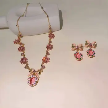 Ogrlica sa roza lukom od dragog kamenja naušnice nakit
